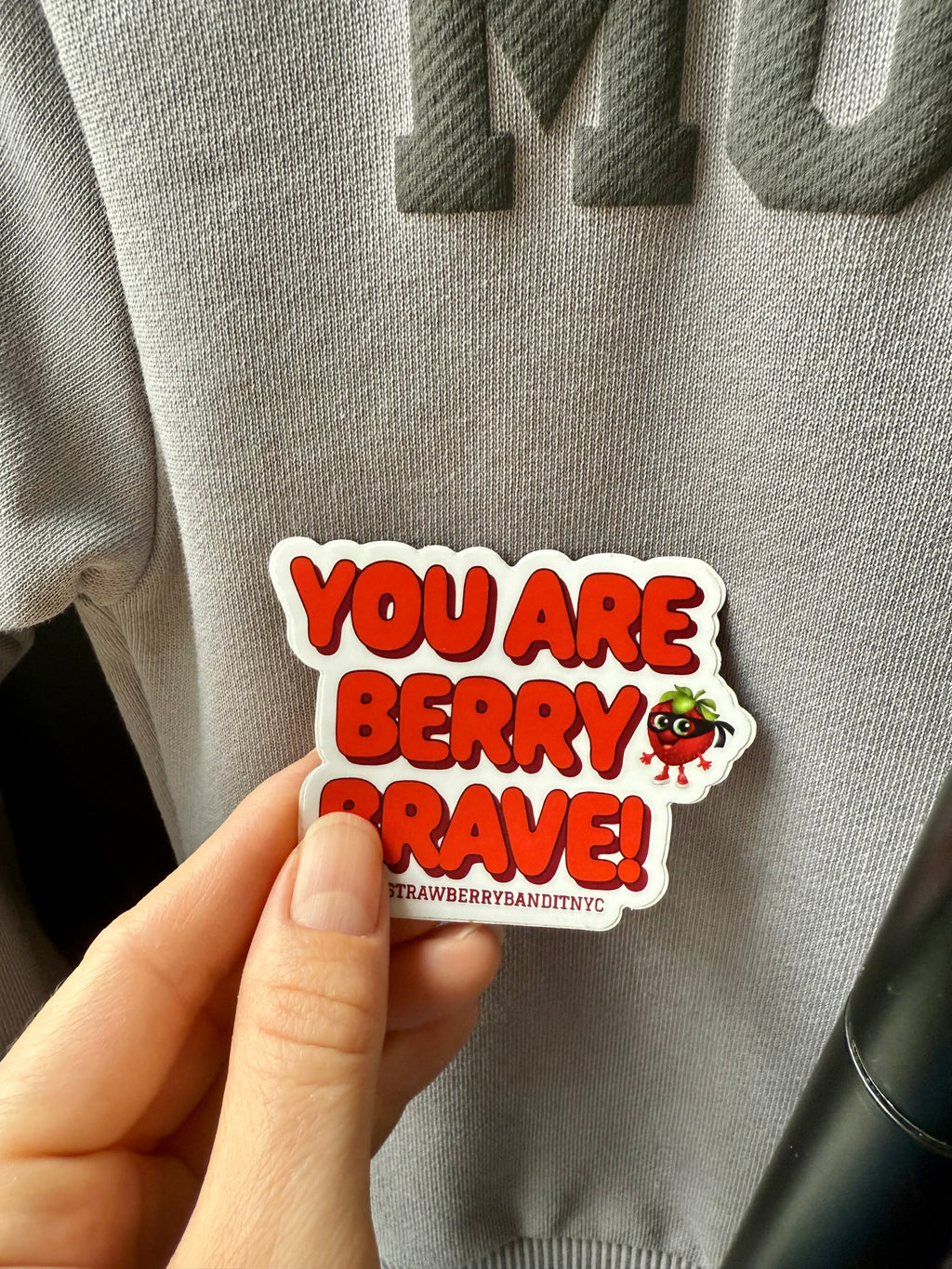 Strawberry Bandit You Are Berry Brave sticker featuring a colorful berry design on a white background.