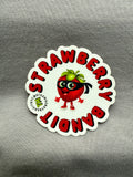 Strawberry Bandit sticker featuring a playful strawberry character with a bandit mask and hat on a colorful background.
