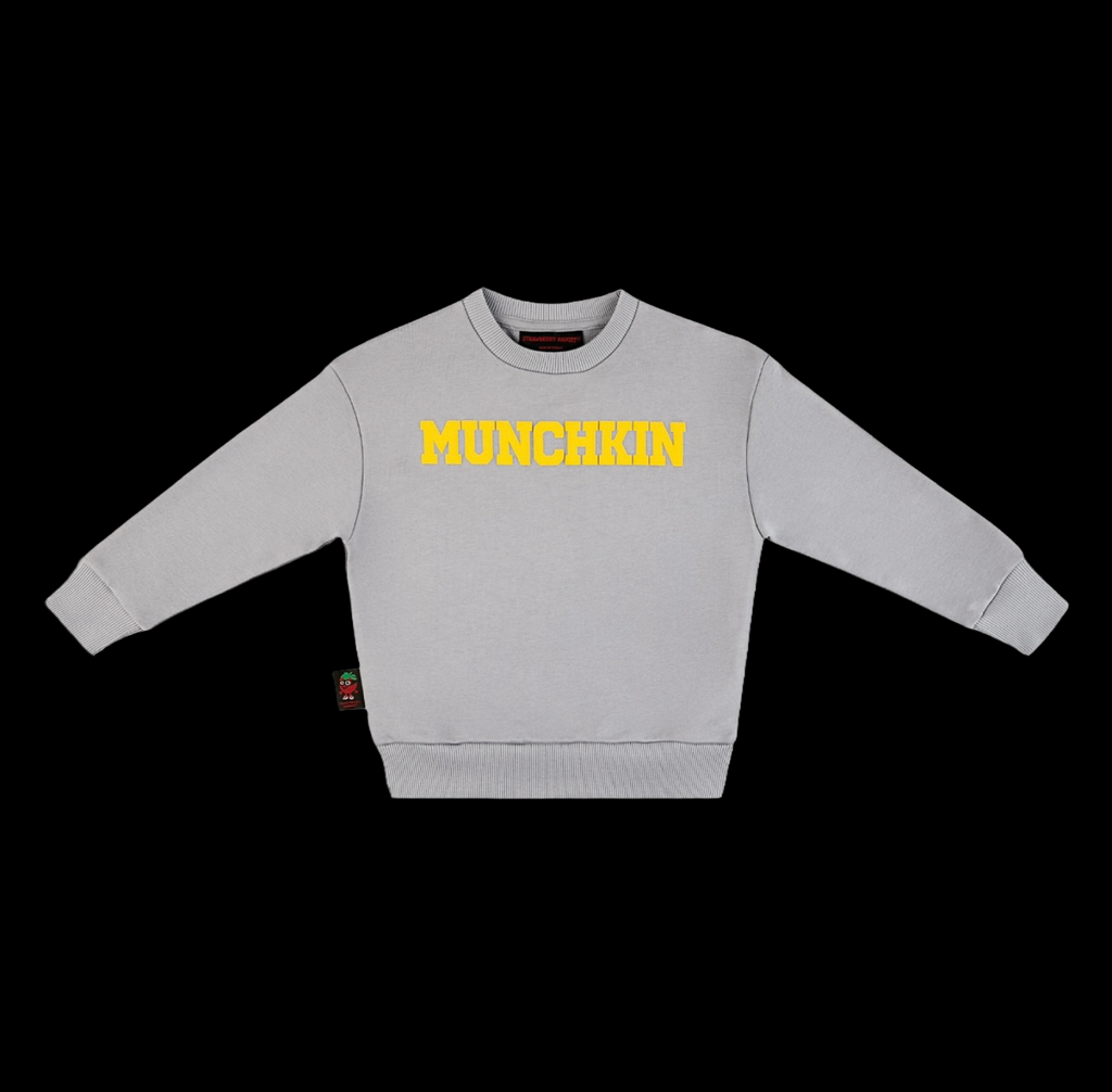 Strawberry Bandit MUNCHKIN Crewneck in Sharkskin Gold Fusion Edition puff print, featuring a stylish yellow design on a gray crewneck sweatshirt.
