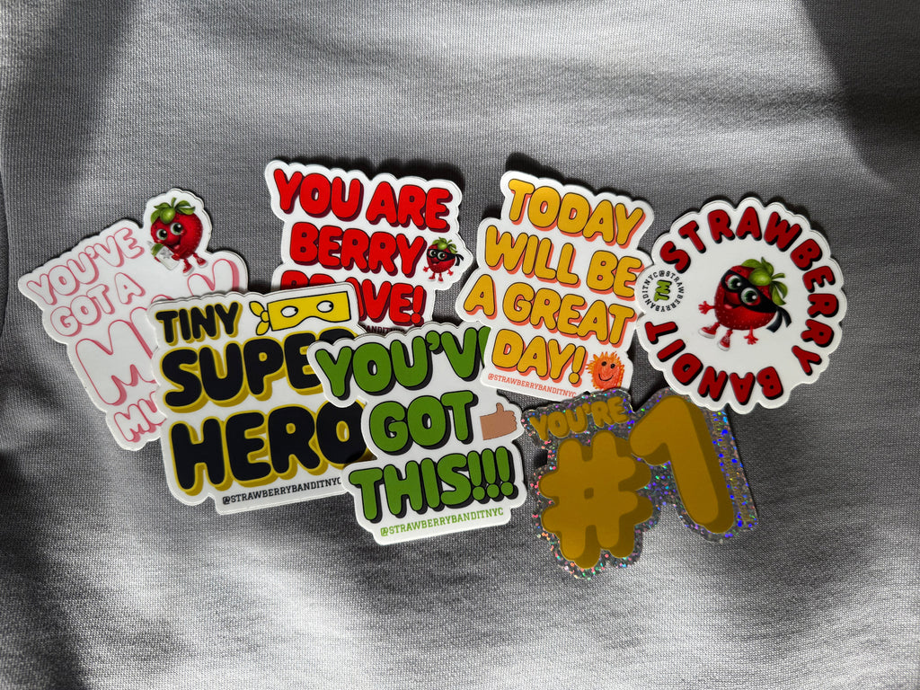 Colorful Strawberry Bandit sticker set featuring playful fruit and character designs on a white background.