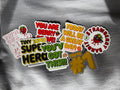 Colorful Strawberry Bandit sticker set featuring playful fruit and character designs on a white background.